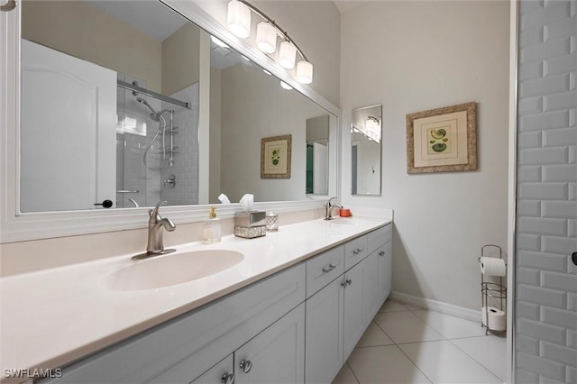 2026 Merlin Ct, Naples, FL 34105 - bathroom with a tile shower, tile patterned floors, and double vanity