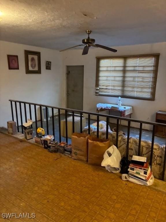 2994 Price Ave, Fort Myers, FL 33916 - sitting room with ceiling fan and a textured ceiling