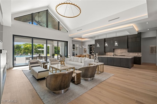 115 E Ave, Naples, FL 34108 - living area with light wood finished floors and a high ceiling