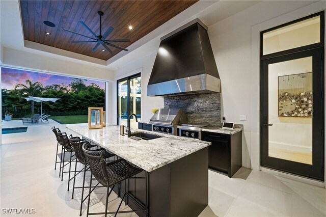 115 E Ave, Naples, FL 34108 - view of patio with area for grilling, grilling area, and ceiling fan