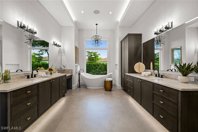 115 E Ave, Naples, FL 34108 - full bath with a soaking tub and two vanities