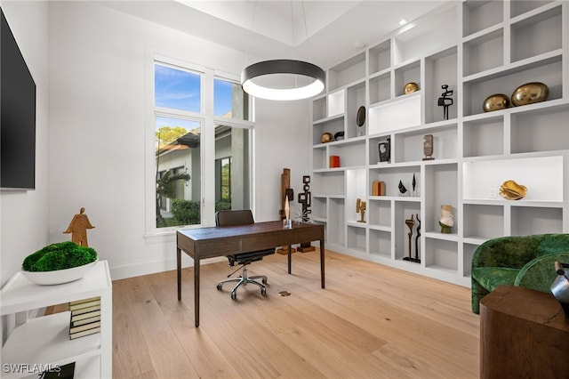 115 E Ave, Naples, FL 34108 - office area with light wood-type flooring and baseboards