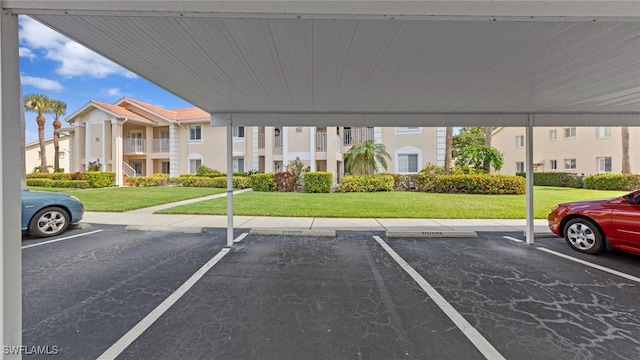 view of partially covered parking lot