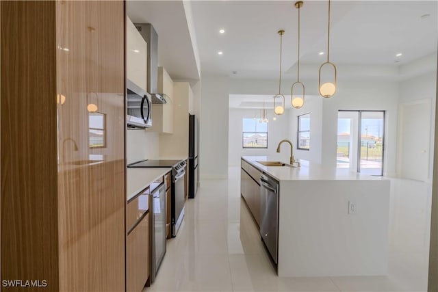 kitchen with modern cabinets, stainless steel appliances, light tile patterned floors, light countertops, and recessed lighting