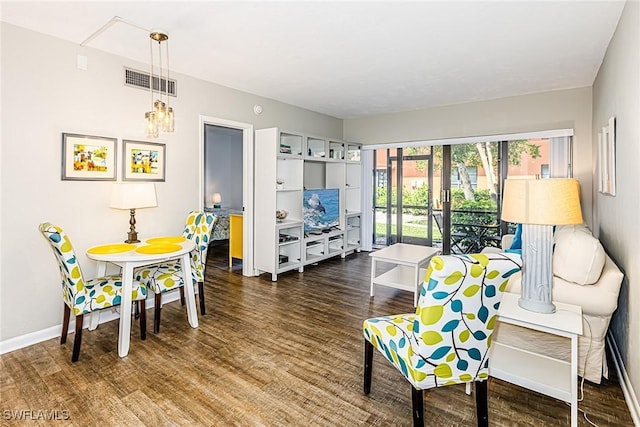 20 Greenbrier St Unit 3-105, Marco Island, FL 34145 - living area with wood finished floors and baseboards