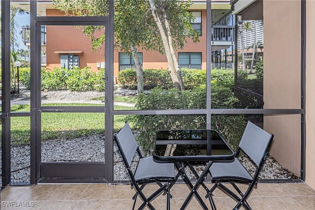 20 Greenbrier St Unit 3-105, Marco Island, FL 34145 - sunroom featuring plenty of natural light