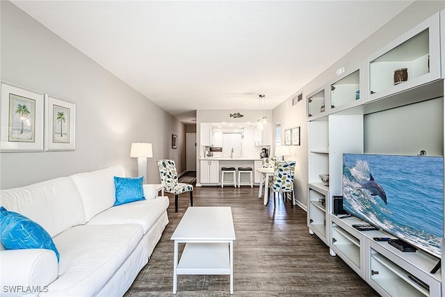 20 Greenbrier St Unit 3-105, Marco Island, FL 34145 - living area featuring dark wood-style floors