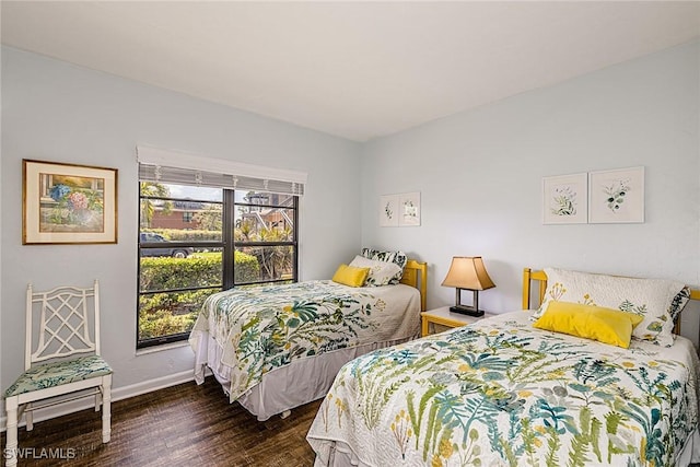 20 Greenbrier St Unit 3-105, Marco Island, FL 34145 - bedroom featuring wood finished floors and baseboards
