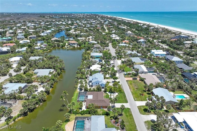 aerial perspective of suburban area featuring a large body of water