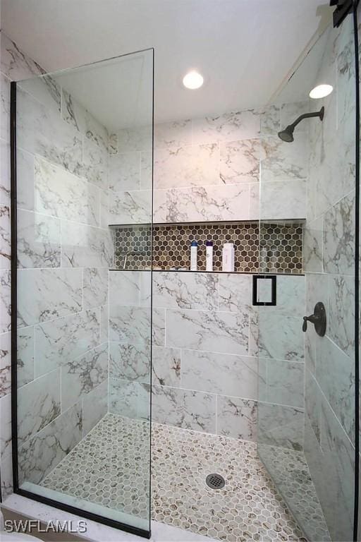 bathroom featuring a stall shower
