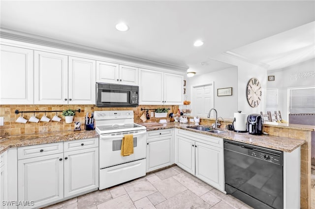 3570 43rd Ave NE, Naples, FL 34120 - kitchen featuring black appliances, a sink, a peninsula, backsplash, and recessed lighting