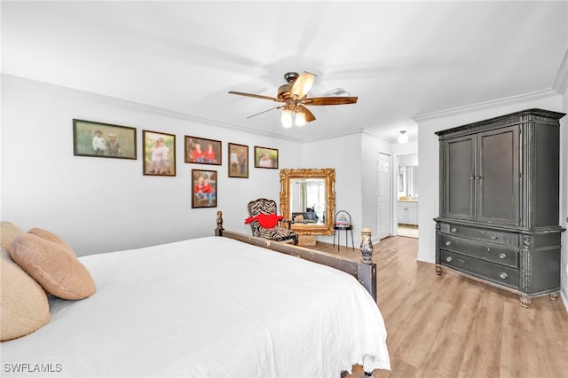 3570 43rd Ave NE, Naples, FL 34120 - bedroom featuring crown molding, light wood-style flooring, ensuite bath, baseboards, and a ceiling fan