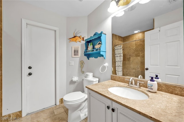 3570 43rd Ave NE, Naples, FL 34120 - bathroom featuring a tile shower, toilet, and vanity