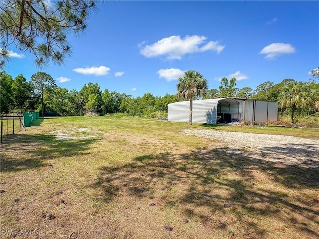 3790 35th Ave NE, Naples, FL 34120 - view of yard with a detached carport