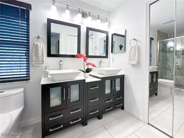 3790 35th Ave NE, Naples, FL 34120 - full bath with double vanity, a stall shower, and tile patterned floors