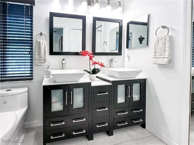 3790 35th Ave NE, Naples, FL 34120 - full bathroom with double vanity and tile patterned floors