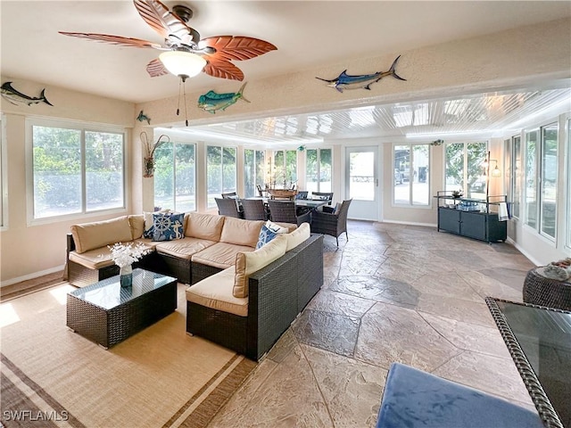 3790 35th Ave NE, Naples, FL 34120 - sunroom with healthy amount of natural light and stone tile flooring
