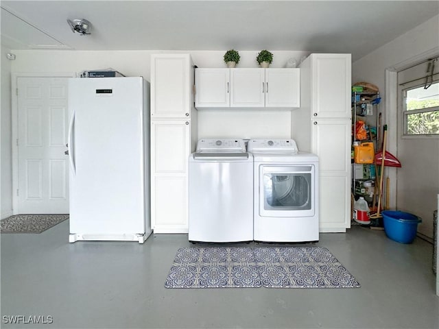 3790 35th Ave NE, Naples, FL 34120 - laundry room featuring cabinet space and independent washer and dryer