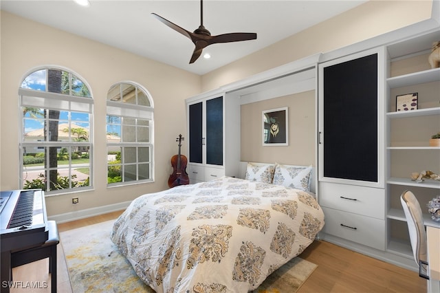 5687 Whispering Willow Way, Fort Myers, FL 33908 - bedroom with light wood finished floors, recessed lighting, and ceiling fan
