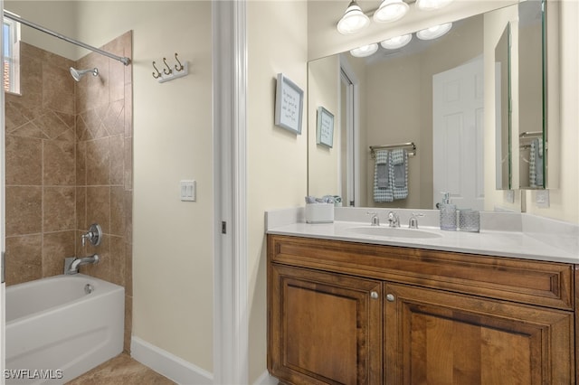 5687 Whispering Willow Way, Fort Myers, FL 33908 - bathroom with vanity,  shower combination, and baseboards