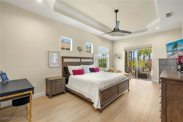 5687 Whispering Willow Way, Fort Myers, FL 33908 - bedroom with ornamental molding, a raised ceiling, access to outside, recessed lighting, and light wood-style floors