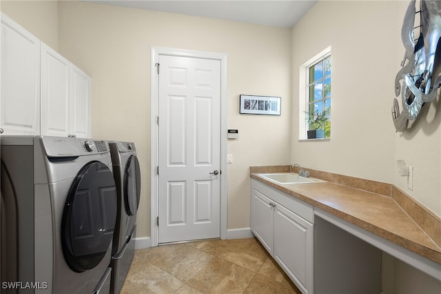 5687 Whispering Willow Way, Fort Myers, FL 33908 - laundry area with washer and dryer, cabinet space, and baseboards