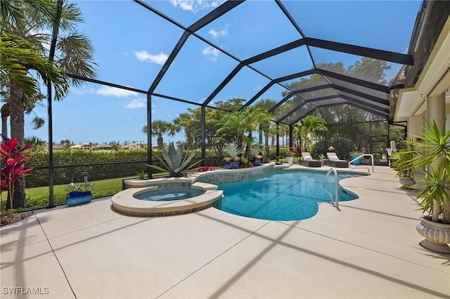 5687 Whispering Willow Way, Fort Myers, FL 33908 - view of swimming pool with a patio area, a pool with connected hot tub, and glass enclosure