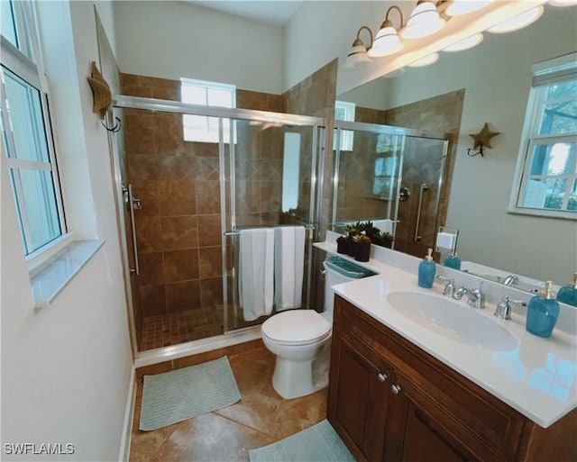 5687 Whispering Willow Way, Fort Myers, FL 33908 - full bathroom with vanity, toilet, a stall shower, and tile patterned flooring