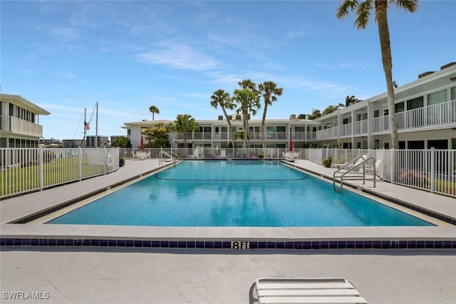354 Harbour Dr Unit 354, Naples, FL 34103 - community pool featuring fence