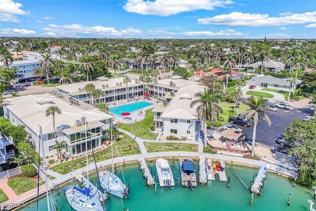 354 Harbour Dr Unit 354, Naples, FL 34103 - aerial perspective of suburban area featuring a pool area and a nearby body of water