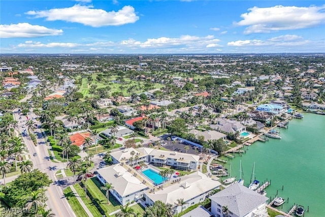 354 Harbour Dr Unit 354, Naples, FL 34103 - aerial view of residential area featuring a large body of water and a pool area