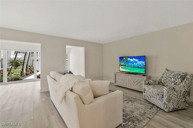 354 Harbour Dr Unit 354, Naples, FL 34103 - living area with light wood-style floors