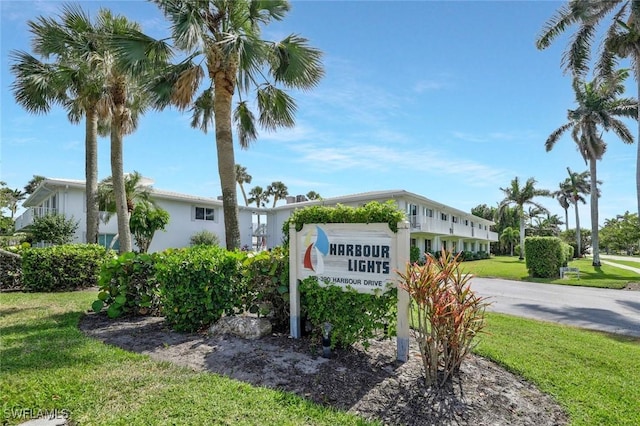 354 Harbour Dr Unit 354, Naples, FL 34103 - community sign featuring a lawn