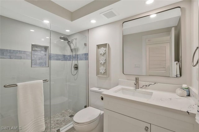 354 Harbour Dr Unit 354, Naples, FL 34103 - full bath featuring tiled shower, toilet, recessed lighting, and vanity