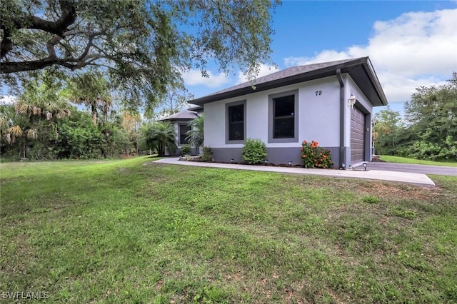 79 41st Ave NE, Naples, FL 34120 - view of property exterior with stucco siding and a lawn