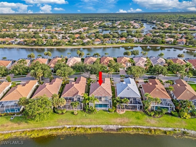 aerial perspective of suburban area featuring a large body of water