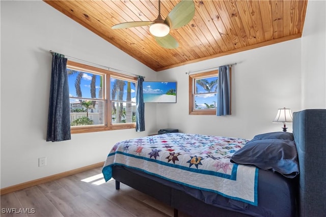 150 Pearl St, Fort Myers Beach, FL 33931 - bedroom featuring wood finished floors, lofted ceiling, wood ceiling, baseboards, and a ceiling fan