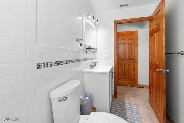 150 Pearl St, Fort Myers Beach, FL 33931 - bathroom with toilet, vanity, and tile patterned flooring