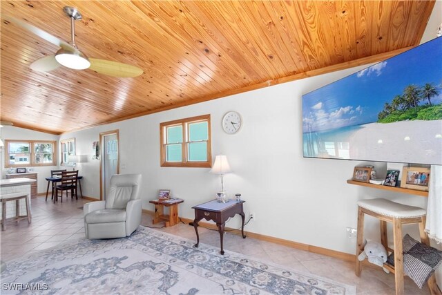 150 Pearl St, Fort Myers Beach, FL 33931 - sitting room featuring wood ceiling, tile patterned flooring, baseboards, crown molding, and lofted ceiling