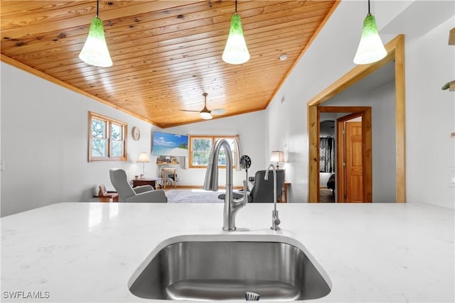 150 Pearl St, Fort Myers Beach, FL 33931 - kitchen with a sink, ceiling fan, wood ceiling, lofted ceiling, and crown molding