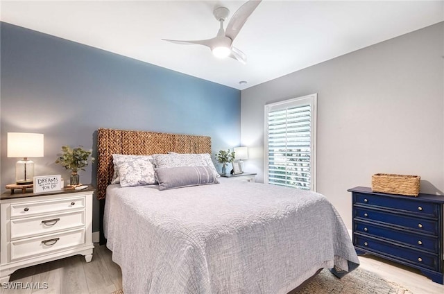 8661 Querce Ct, Naples, FL 34114 - bedroom featuring wood finished floors and ceiling fan
