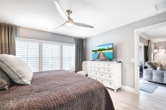 8661 Querce Ct, Naples, FL 34114 - bedroom with light wood-type flooring, a ceiling fan, and baseboards
