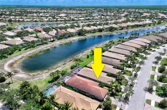 8661 Querce Ct, Naples, FL 34114 - aerial view of residential area with a large body of water