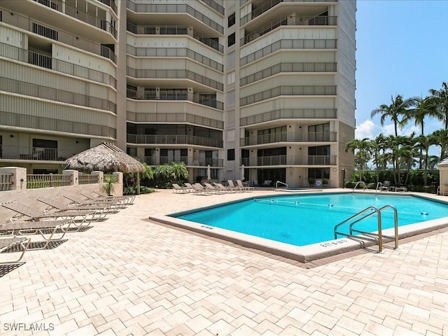 840 S Collier Blvd Unit 706, Marco Island, FL 34145 - community pool featuring a patio