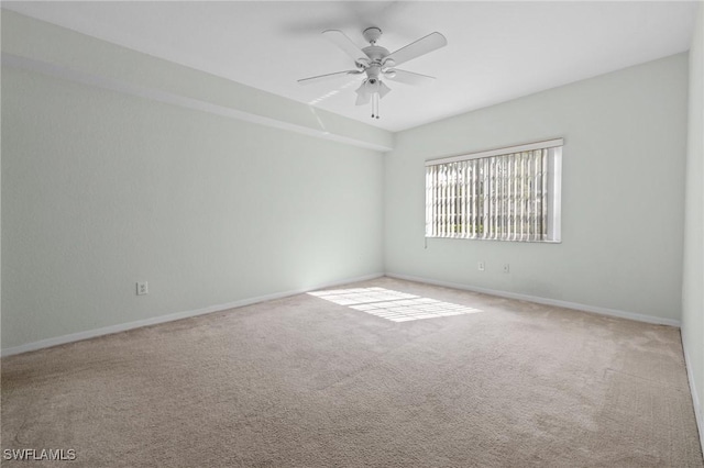27075 Matheson Ave Unit 105, Bonita Springs, FL 34135 - spare room with a ceiling fan, carpet, and baseboards