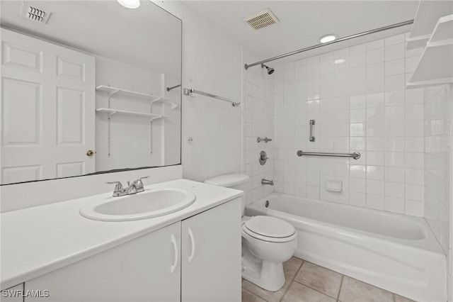 27075 Matheson Ave Unit 105, Bonita Springs, FL 34135 - bathroom with tile patterned flooring, toilet, vanity, and shower / bathtub combination