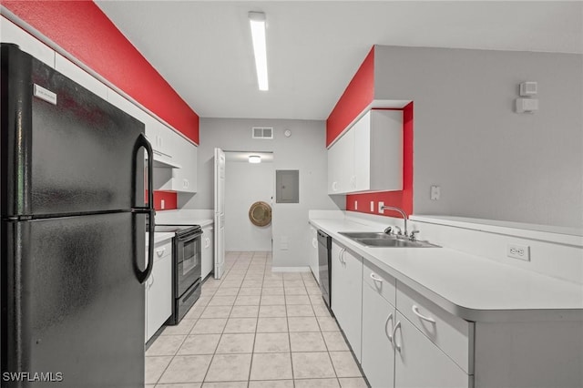 27075 Matheson Ave Unit 105, Bonita Springs, FL 34135 - kitchen with black appliances, a sink, light countertops, white cabinetry, and light tile patterned flooring