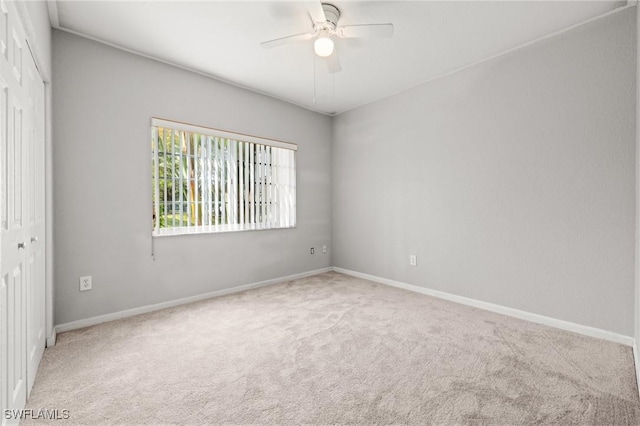 27075 Matheson Ave Unit 105, Bonita Springs, FL 34135 - carpeted empty room featuring ceiling fan and baseboards