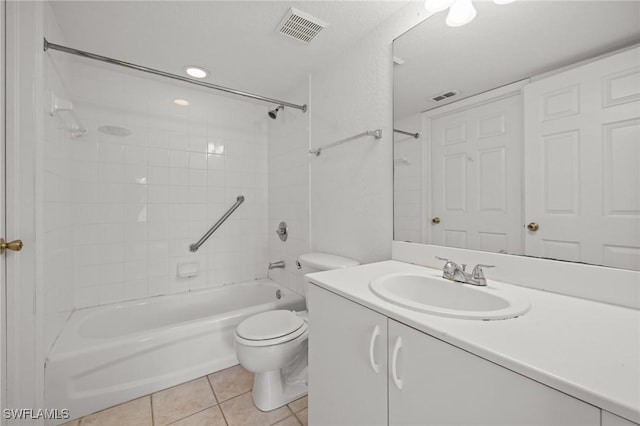 27075 Matheson Ave Unit 105, Bonita Springs, FL 34135 - bathroom featuring toilet, tile patterned floors, tub / shower combination, and vanity