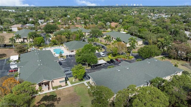 27075 Matheson Ave Unit 105, Bonita Springs, FL 34135 - aerial view of property and surrounding area with a pool area